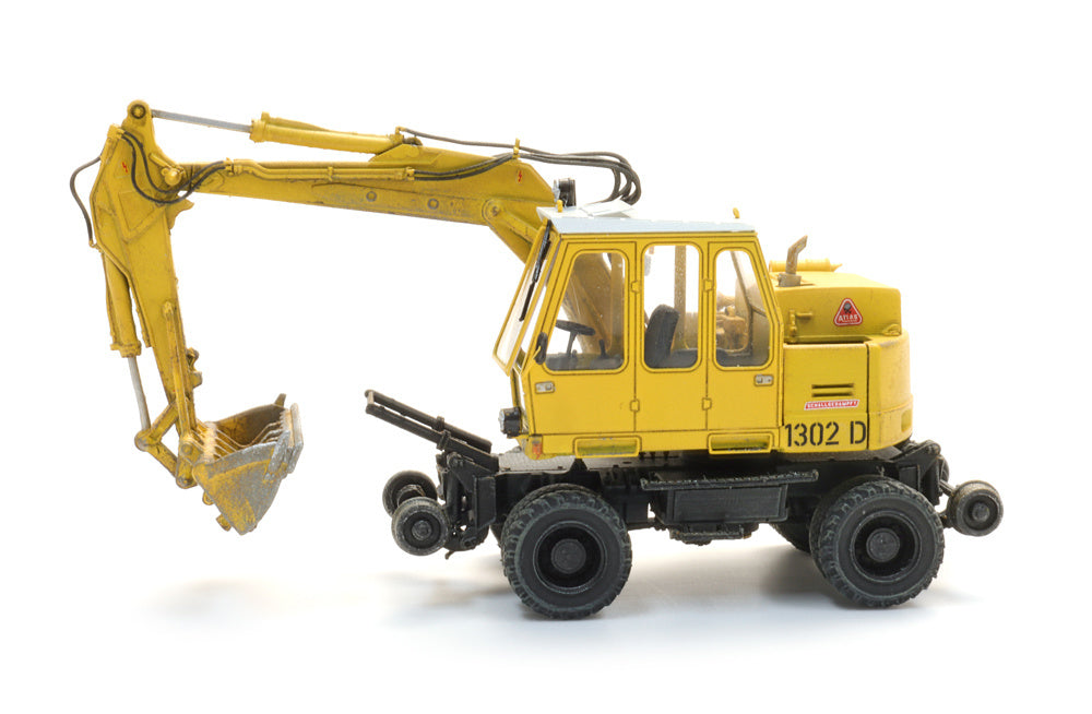 Artitec 387.636 Atlas 1302 DKZW road-rail excavator in yellow – 1:87 HO scale